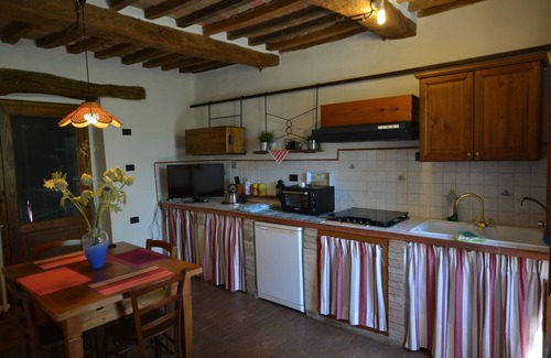 Radicondoli Appartement | Maison de vacances en campagne avec piscine et jardin privatif
