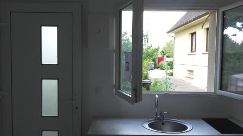 Saint-Aubin-Les-Elbeuf Maison | La maisonnette du Jardin Fleuri
