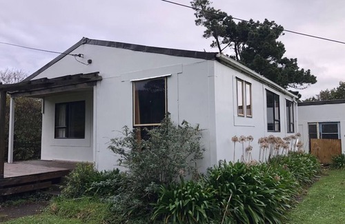 Mokihinui Maison | Laid back retreat, footsteps to the sand and river mouth, with stunning scenery.