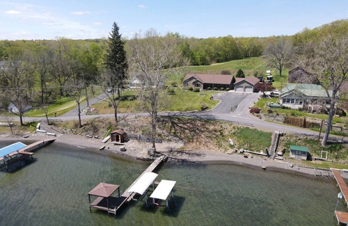 Himrod Maison | Lake front 8-bedroom house with movie theatre, hot tub, and game room!