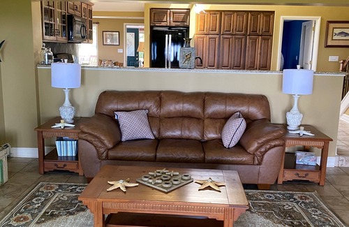 Irving Maison | Lake Front Home. Private stairs to private beach and bay. upscale 5 bedroom home
