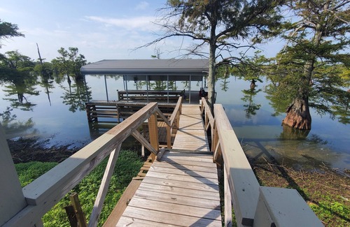 Oneida Maison | Lake front rustic fishing camp