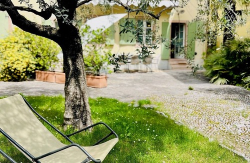 Torbole sul Garda Maison | Lac de Garde: villa idyllique dans un village paisible planté d'oliviers et de palmiers