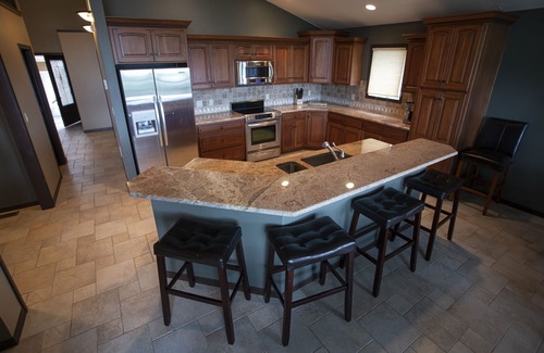 Brule Maison | Lake Mac House sur le 18e trou du Bayside Golf Club