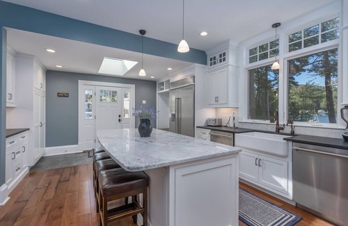 West Alton Maison | Lake Winnipesauke compound sleeps 22 in13 bedrooms stunning sunset views