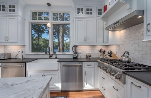 West Alton Maison | Lake Winnipesauke compound sleeps 22 in13 bedrooms stunning sunset views