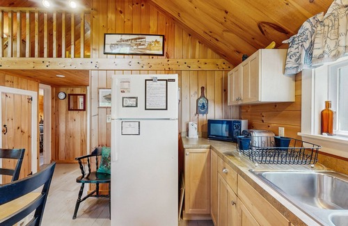 Greenville Cottage | Lakefront, cabin-inspired home with firepit, grill, & screened porch, Wifi