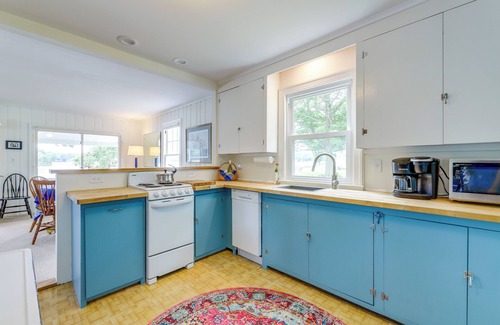 Coventry Lake Cottage | Lakefront Cottage w/ Covered Porch & Dock!