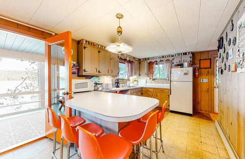 Meredith Cottage | Lakefront cottage with private dock, water access, community beach & kayak