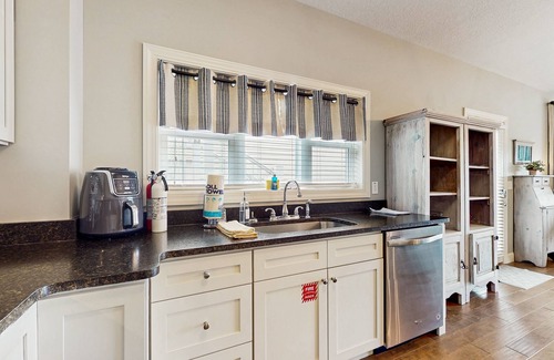 La Follette Maison | Lakefront home with decks, shared pool, clubhouse, golf close by, Wi-Fi
