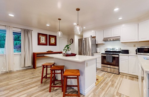 Snoqualmie Maison | Lakefront home with private dock, lake views, firepit, & wood stove