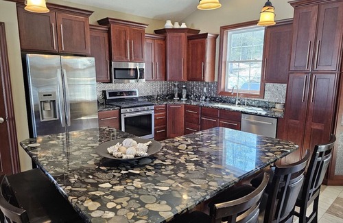 Wetmore Maison | Lakehouse near Pictured Rocks, Trails, Personal Bar, Game Room, & Hot Tub!