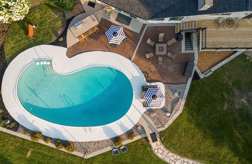 Battle Creek Maison | Lakehouse w/ Heated Pool, Hot Tub, Pontoon, Kayaks, Games
