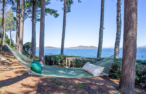 Alton Bay Maison | Lakeside cottage with Lake Winnipesaukee views & private boat dock, dog-friendly