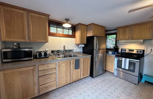 Alton Bay Cottage | Lakeview, Winniescapes, cozy, family, pets, boat slip, beach, trails, skiing