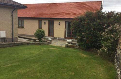 Wick Maison | Langley Cottage with patio, spacious rooms - part of Langley Serviced Apartments several properties in Wick