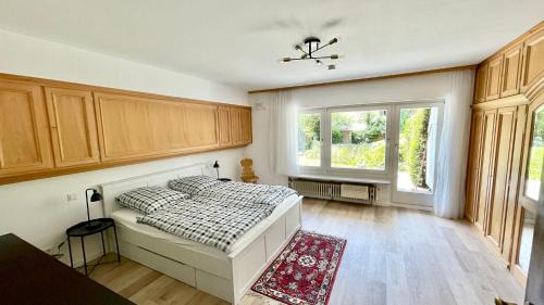 Lenggries Appartement | Large holiday apartment with sauna, terrace, garden and open fireplace