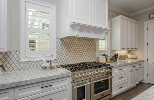 Evans Maison | Large, Luxury, Family-Sized Home with Game Room, Screened Porch & Exercise Area