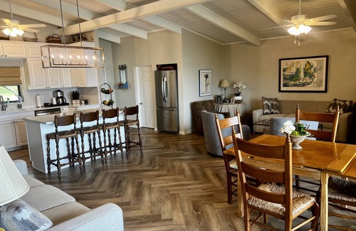 Graford Maison | Large, shady patio with deep-water two-story dock with sunset views. Sleeps 8
