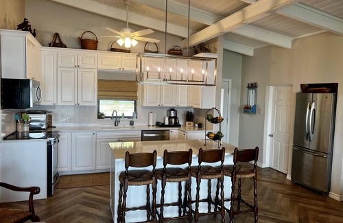 Graford Maison | Large, shady patio with deep-water two-story dock with sunset views. Sleeps 8
