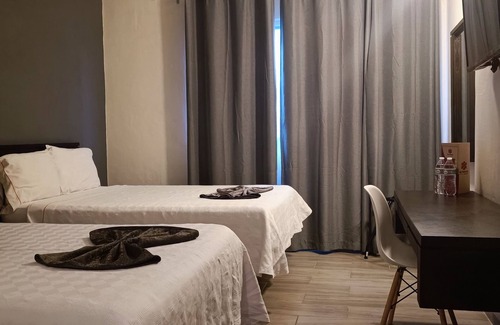 Zona Minerva Hôtel | Las Pérgolas