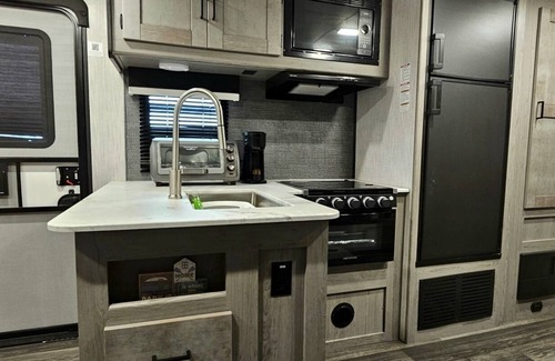 Redding Maison | Launchpad McQuack the 32' RV