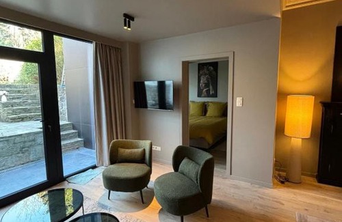 Waha Appartement | Le 76 appartement 2 chambres avec jardin