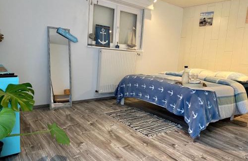 Ingwiller Appartement | Le Pi'style(chambre,cuisine,salle d’eau,terrasse)