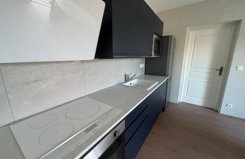 Baden Appartement | Les Hauts de Locmiquel apartment with private heated pool