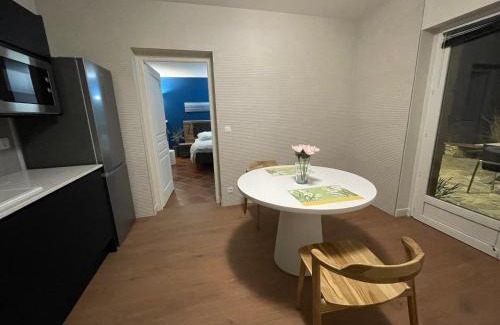 Baden Appartement | Les Hauts de Locmiquel apartment with private heated pool