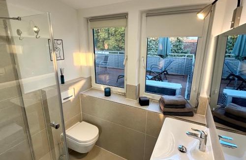 Kaltenweide Appartement | LGH-Moderne, ruhige Wohnung, Nähe zum Flughafen und Autobahn, 24h-self-check-in, vollausgestattet, DisneyPlus, Waschmaschine