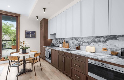 Bowery Appartement | Library Loft by StayHaus | 2BR Full-Service Condo with Terrace