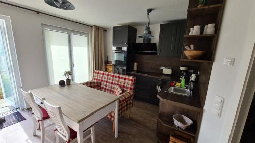 Gelbensande Appartement | Lieblingszeit im Küstenwald Graal-Müritz
