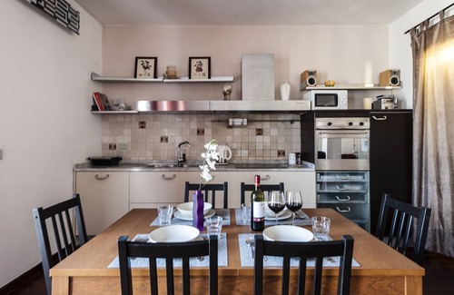 Pisa Appartement | Lumière et bois près de la tour