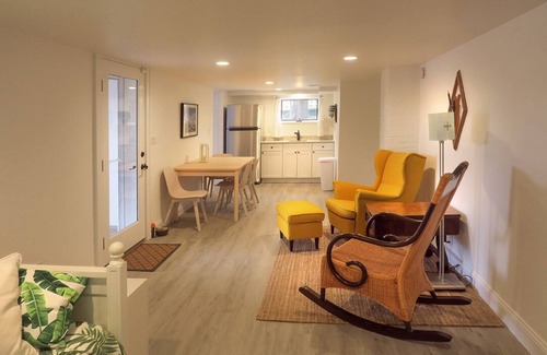Riverhead Maison | Light rippling on river, private dock, nature preserve beyond