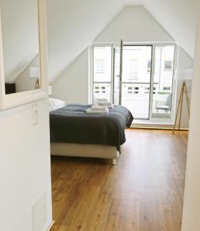 Warnemuende Appartement | LIGHTHOUSE HOMES - moderne Ferienwohnungen mit Terrasse am Kirchenplatz