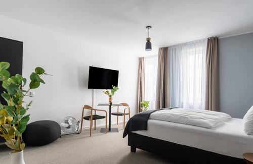 Innere Stadt Appartement | limehome Linz Friedrichstr | Suite XL seating area