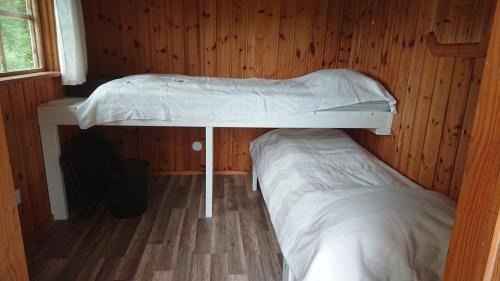 Osthammar Autre | Liten enklare klimatsmart stuga i Roslagen