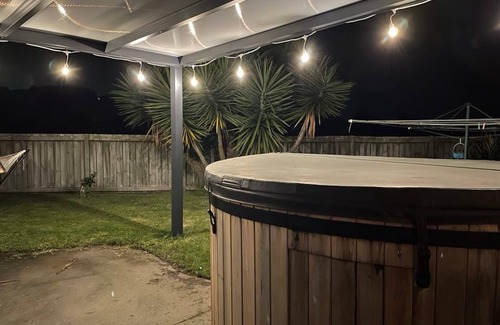 Papamoa Beach Maison | LOCATION. Close to the beach, reserve and shops. Fenced yard with a Spa.
