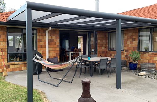 Papamoa Beach Maison | LOCATION. Close to the beach, reserve and shops. Fenced yard with a Spa.