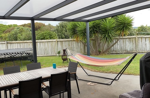 Papamoa Beach Maison | LOCATION. Close to the beach, reserve and shops. Fenced yard with a Spa.
