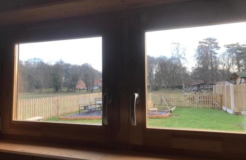 High Ercall Appartement | Log Cabin in Tiny Village