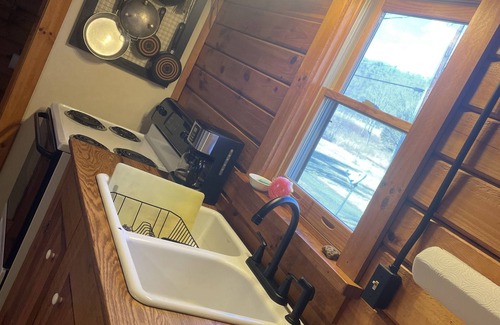 Greenbrier River Cabine | Newly Renovated Log Cabin located on the Greenbrier River in Hinton WV