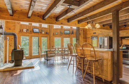 Cedarhurst Cabine | Log Cabin with living room fireplace and hot tub