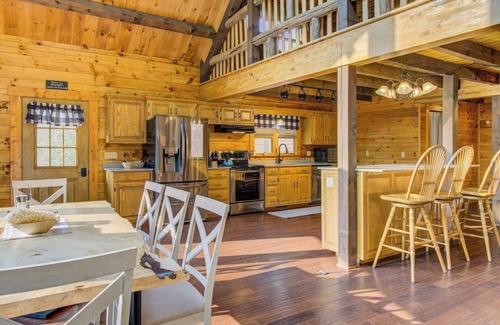 Cedarhurst Cabine | Log Cabin with living room fireplace and hot tub