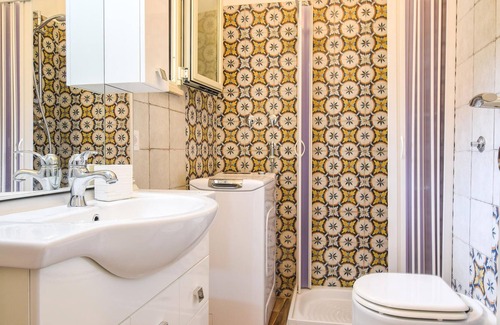 Scilla Appartement | Look forward to a beautiful view of the sea in this beachfront vacation rental.