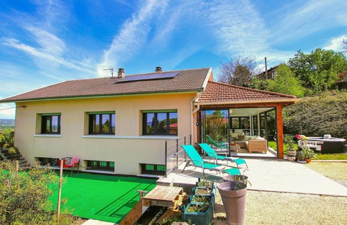 Saint-Romans Maison | Look forward to spending your vacation in this vacation home with outdoor hot tub.