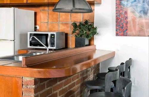 Antigua Guatemala Villa | Look up at the stars as you lie on the sofa in this loft apartment