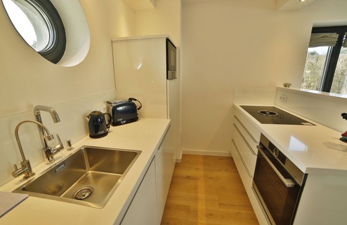 Prora Appartement | Lotsenloft 16 in Prora Düne 7 with its own sauna, fireplace and roof terrace