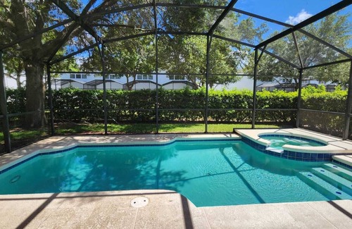 Clear Creek Maison | Lovely 5-bedroom house with pool/spa minutes from Disney.